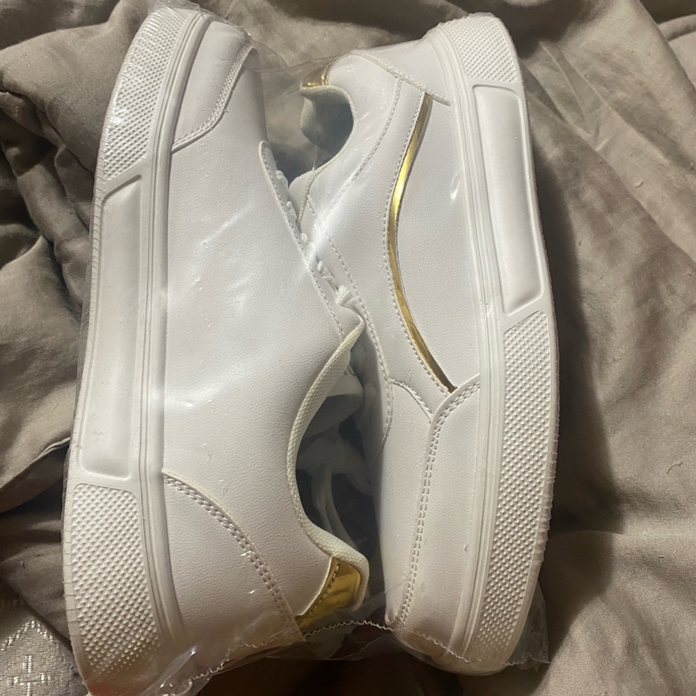 White Sneakers with Gold Accents
